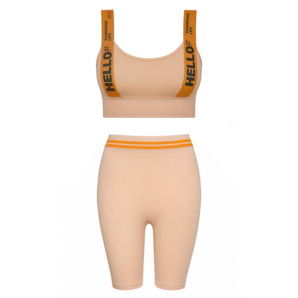 ست نیم تنه و شلوارک ورزشی زنانه رنگ کرم ماییلدا مدل 5327