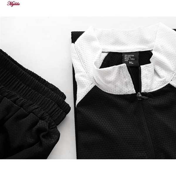 ست تی شرت آستین کوتاه و شلوارک ورزشی مردانه رنگ مشکی مدل 5374-806 ماییلدا - تصویر 5