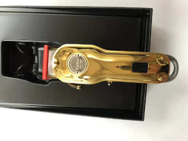 ماشین اصلاح موی سر و صورت شارژی کمی Kemei Professional Hair Clipper KM-1986 - تصویر 9