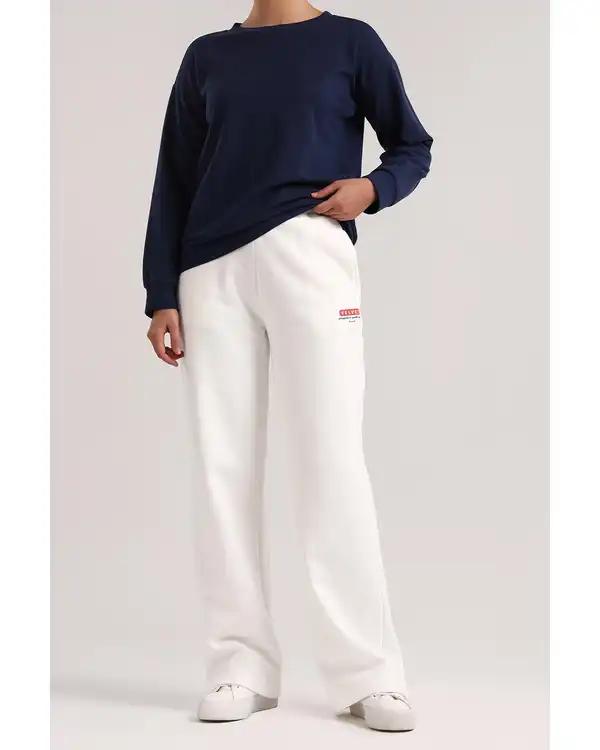 شلوار زنانه دورس سفید سارک Sarak مدل 5027