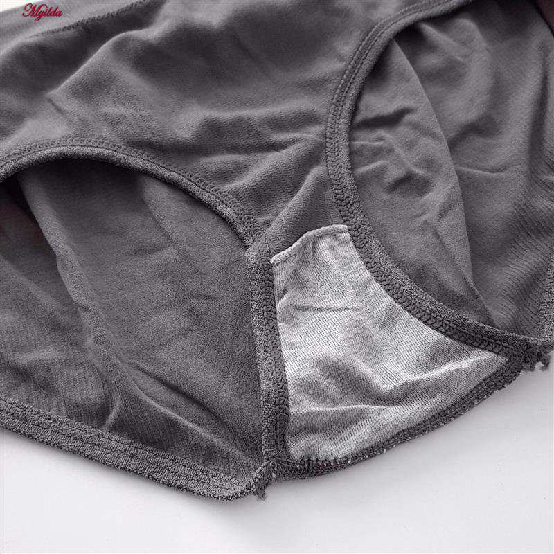 ست نیم تنه و شورت ورزشی زنانه خاکستری تیره مدل 4620 ماییلدا