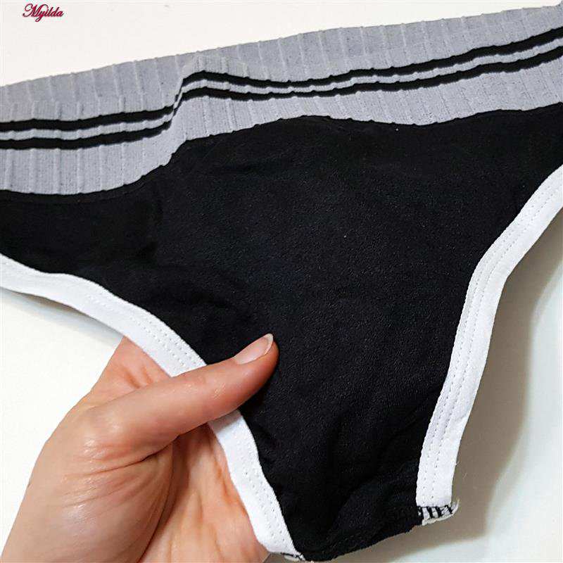 ست نیم تنه و شورت ورزشی زنانه CK مشکی پددار کد 4751 ماییلدا