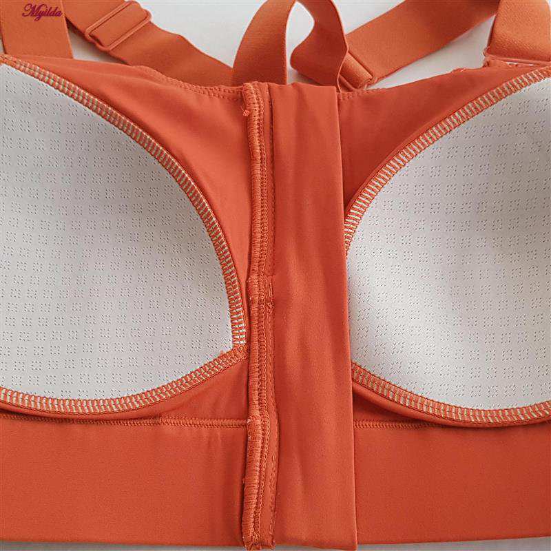 نیم تنه ورزشی زنانه ملییلدا مدل جلو زیپدار پد ثابت کد 5018 رنگ نارنجی ماییلدا