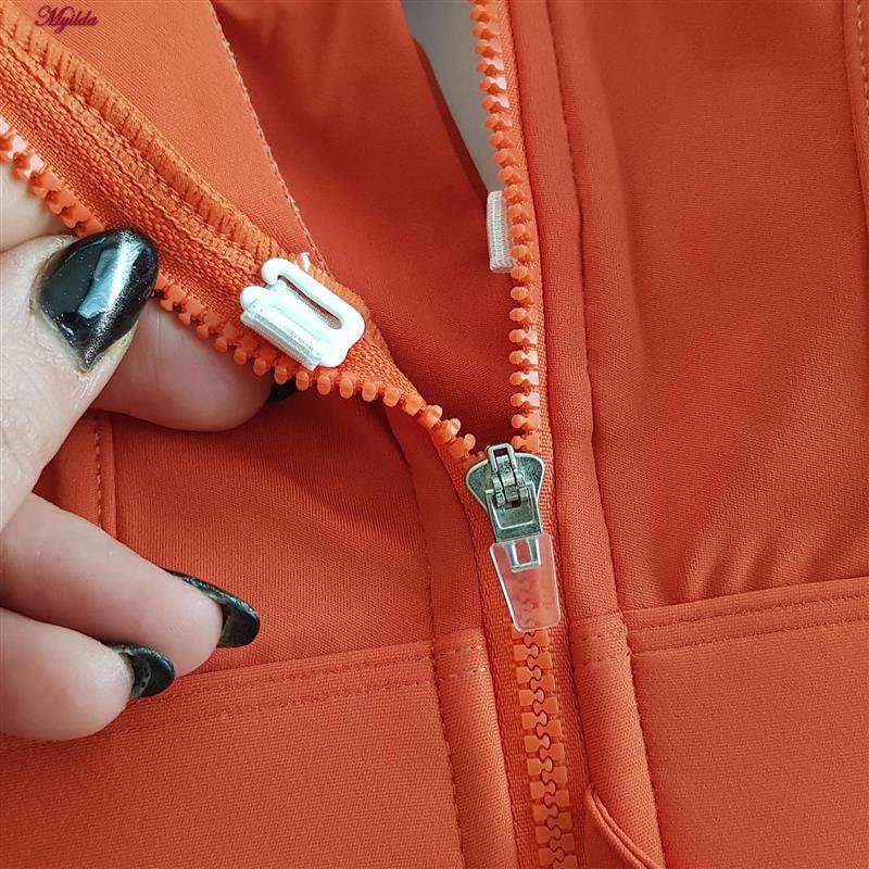 نیم تنه ورزشی زنانه ملییلدا مدل جلو زیپدار پد ثابت کد 5018 رنگ نارنجی ماییلدا