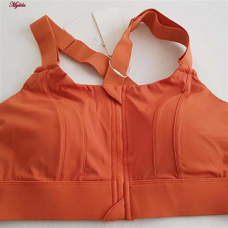 نیم تنه ورزشی زنانه ملییلدا مدل جلو زیپدار پد ثابت کد 5018 رنگ نارنجی ماییلدا