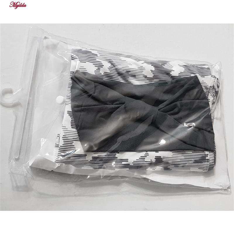 ست تاپ و شلوارک ورزشی زنانه رنگ طوسی به همراه هدبند مدل 5215-746P ماییلدا