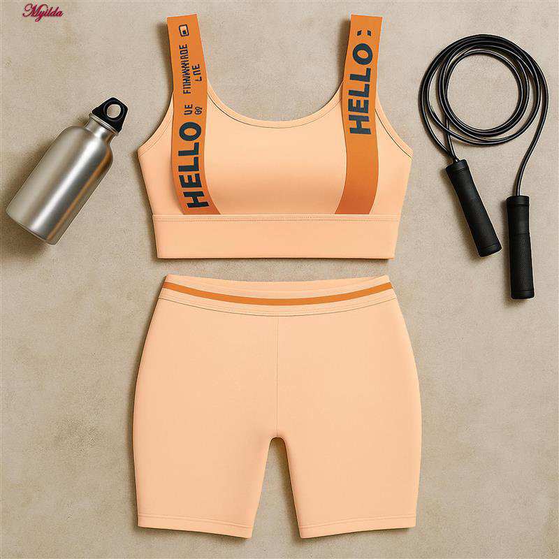 ست نیم تنه و شلوارک ورزشی زنانه رنگ کرم ماییلدا مدل 5327