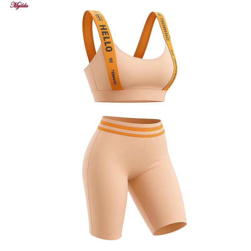 ست نیم تنه و شلوارک ورزشی زنانه رنگ کرم ماییلدا مدل 5327