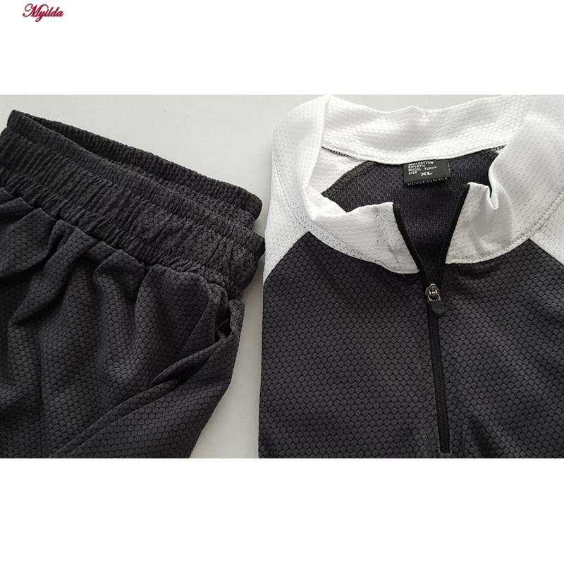 ست تی شرت آستین کوتاه و شلوارک ورزشی مردانه رنگ خاکستری مدل 5374-806 ماییلدا