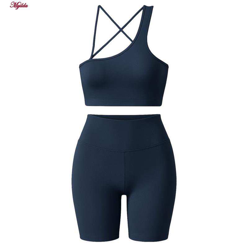 ست نیم تنه و شلوارک ورزشی زنانه رنگ سرمه ای ماییلدا مدل 5409-7106