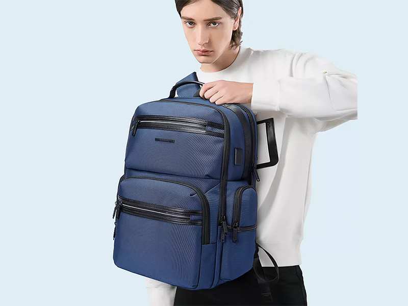 کوله پشتی پارچه ای ضد آب یو اس بی دار بنج مناسب تبلت و لپ تاپ تا 15.6 اینچ Bange BG-2601 Backpack with USB Port