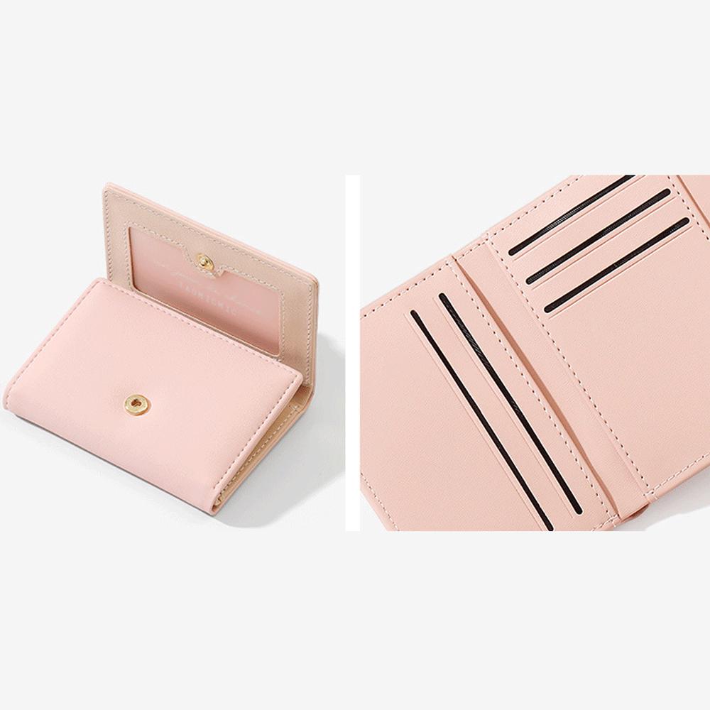 کیف پول زنانه فانتزی تاشو طرح گل بابونه تائومیک میک Y9265