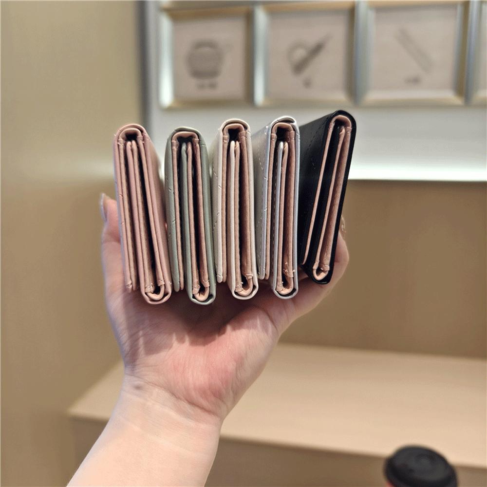 کیف پول زنانه تاشو تائومیکمیک Y9262