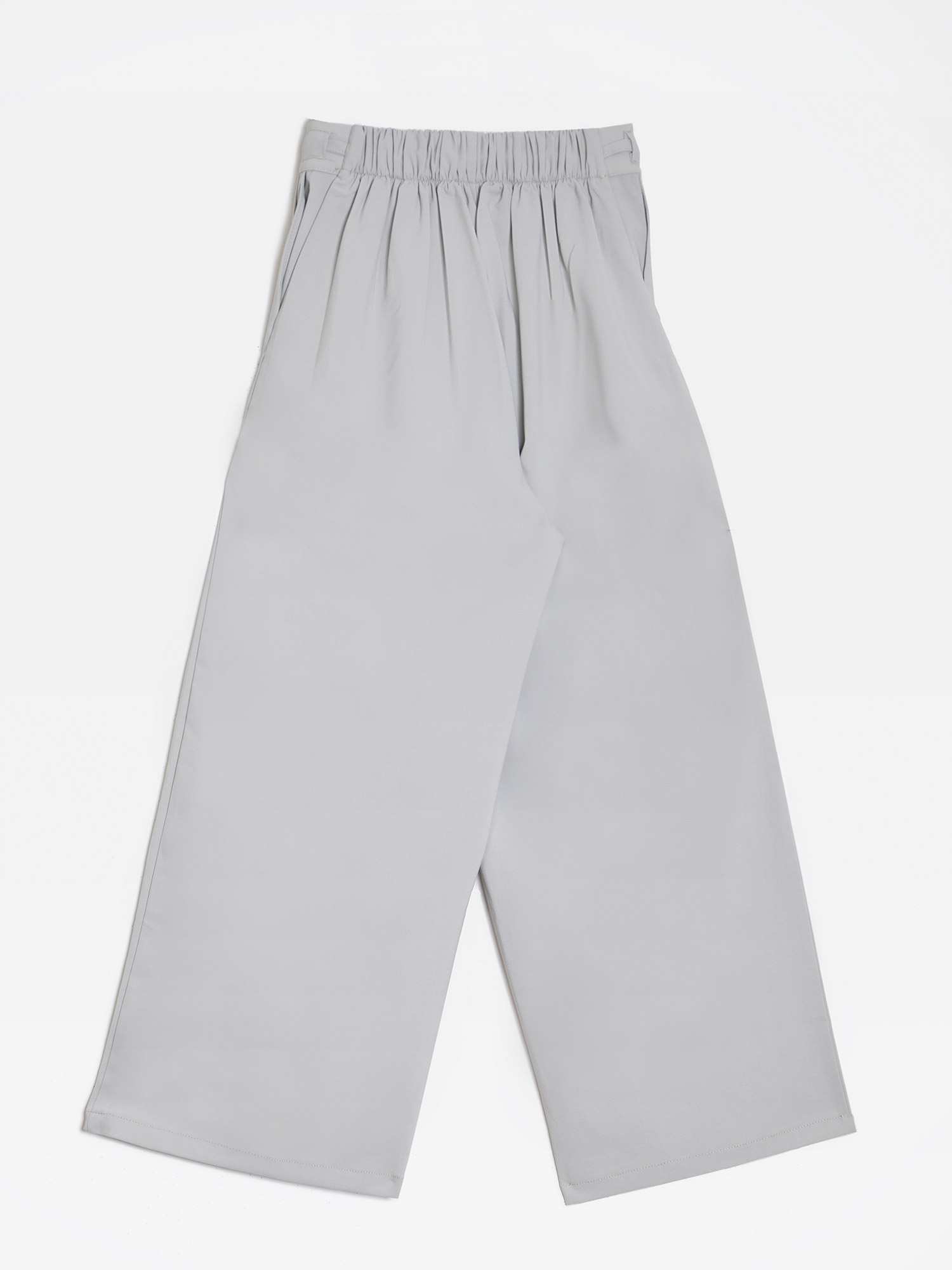 شلوار زنانه پارچه ای کرپ کره ای از بالا گشاد پیلی دار پشت کمرکش کژوال آرانا برنس Bornos