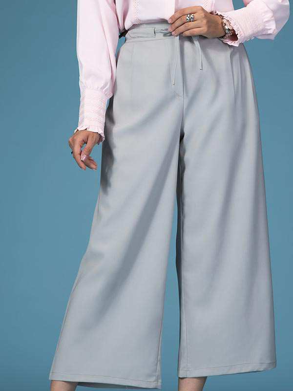 شلوار زنانه پارچه ای کرپ کره ای از بالا گشاد پیلی دار پشت کمرکش کژوال آرانا برنس Bornos