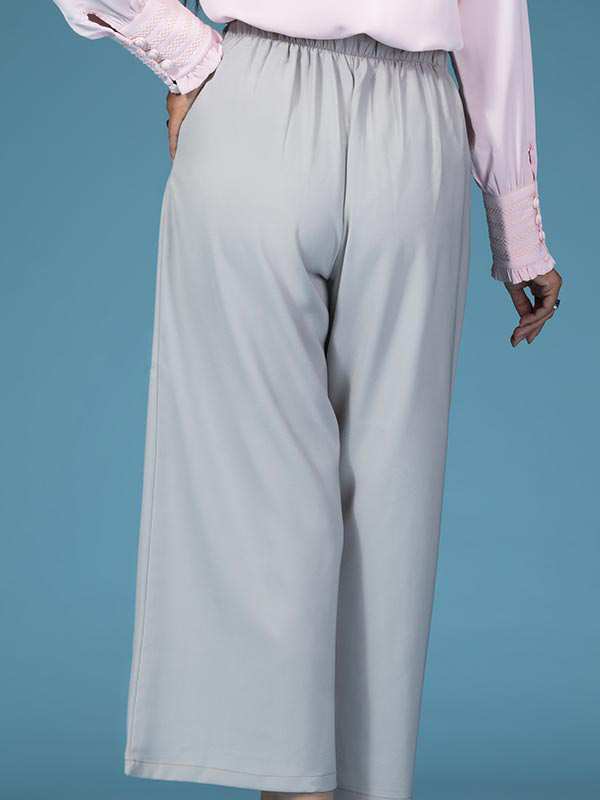 شلوار زنانه پارچه ای کرپ کره ای از بالا گشاد پیلی دار پشت کمرکش کژوال آرانا برنس Bornos