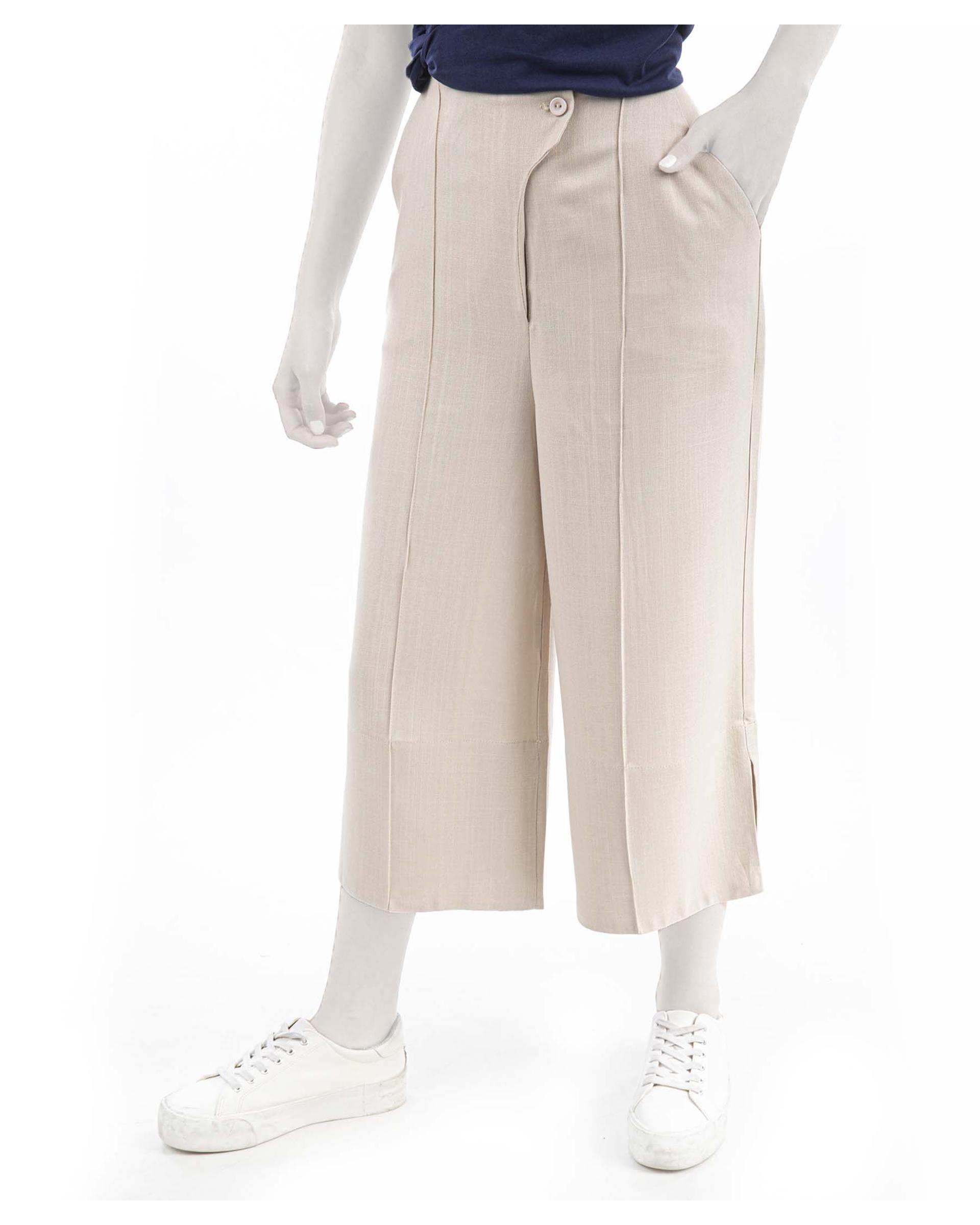 شلوار پارچه ای زنانه کرم ریس Rees کد 1030085-25