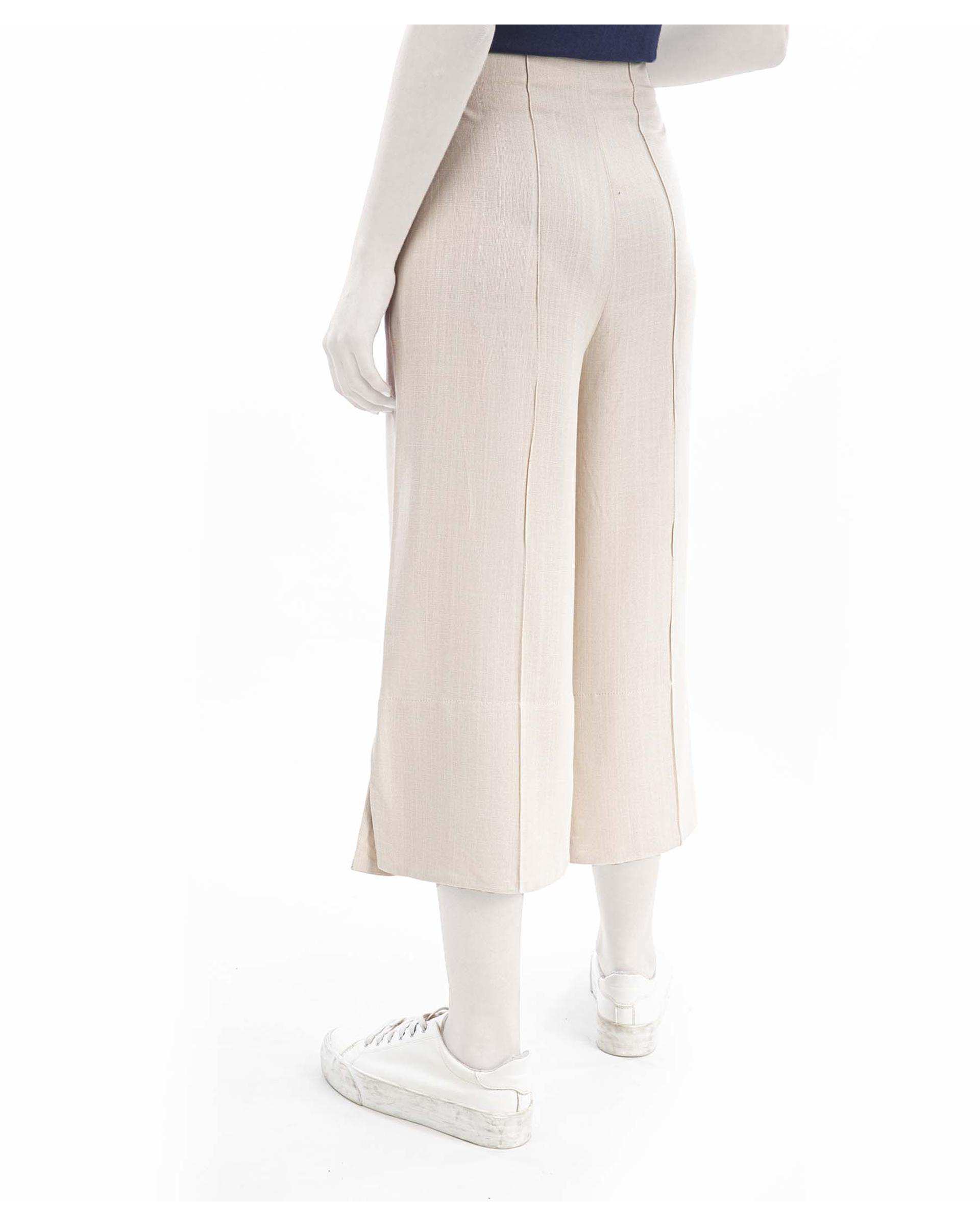 شلوار پارچه ای زنانه کرم ریس Rees کد 1030085-25