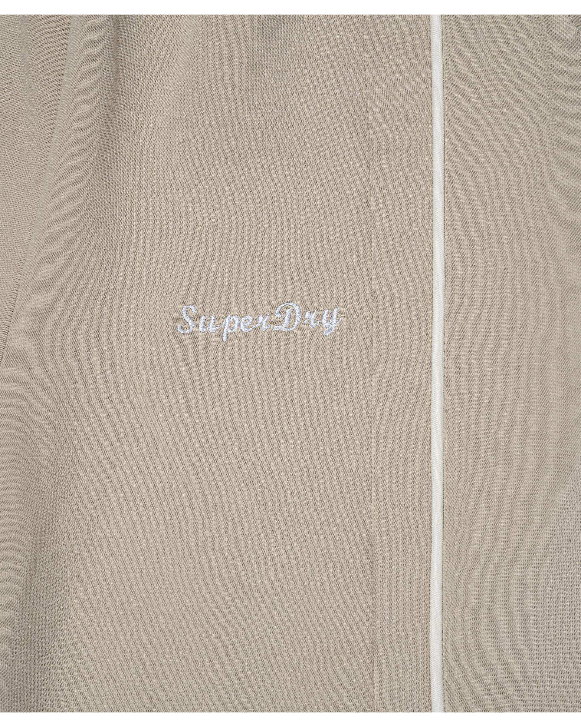 شلوار زنانه اسلش کرم سوپردرای Superdry کد 6036001