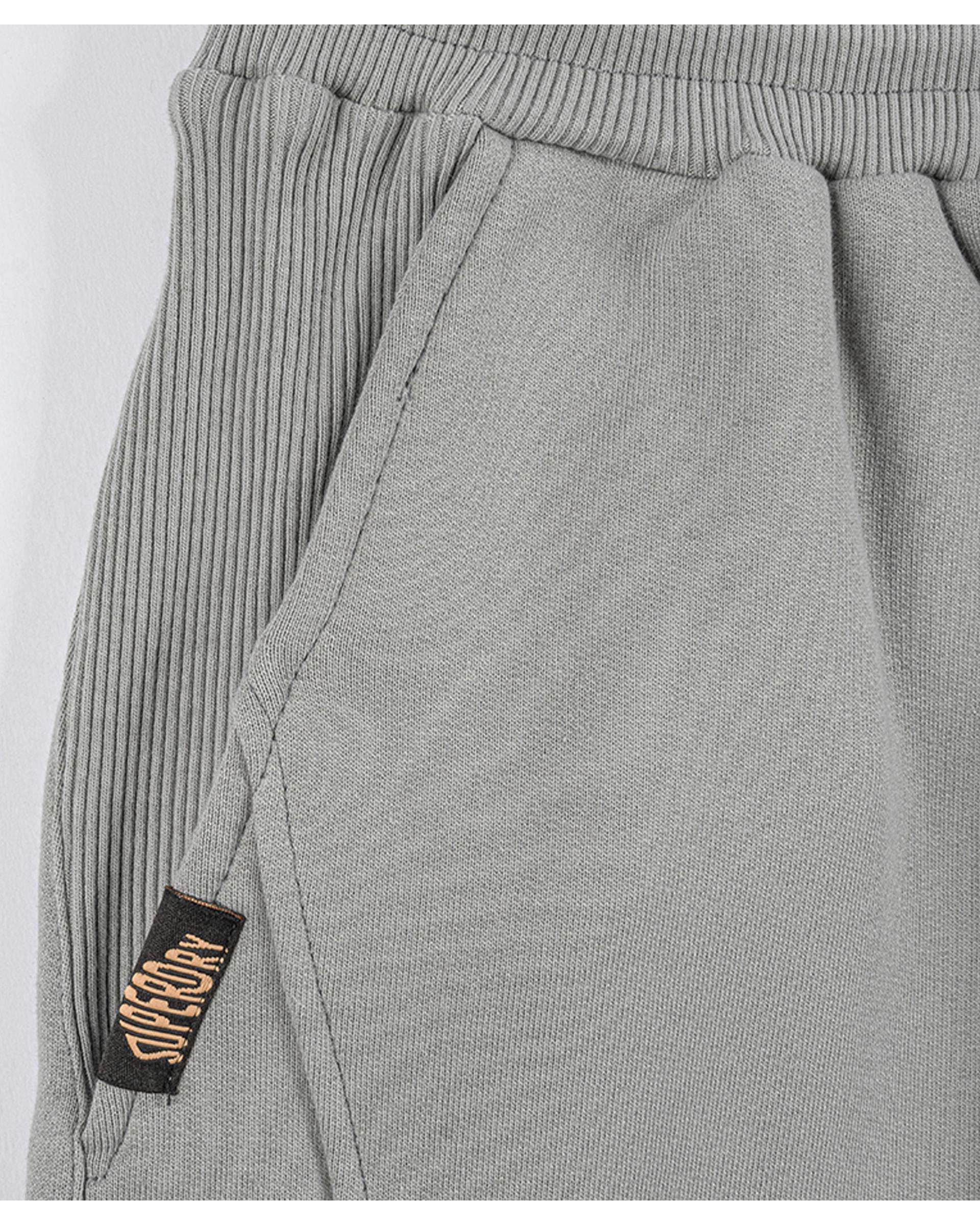 شلوار مردانه اسلش کرم سوپردرای Superdry کد 7036005